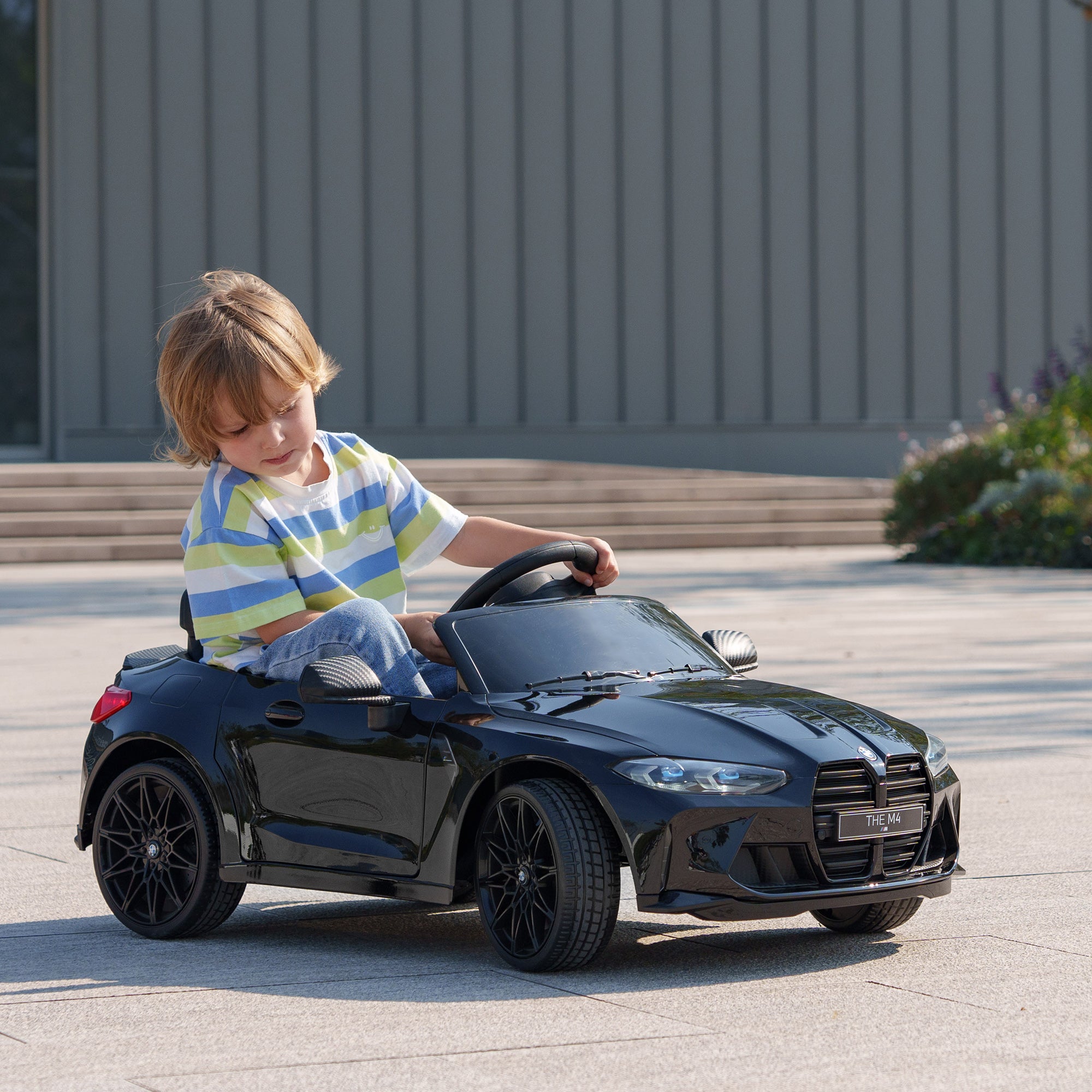 AIYAPLAY 12V BMW M4 Licensed Kids Car with Easy Transport, Remote Control, Suspension, Music, Horn, LED Lights - Black - anydaydirect